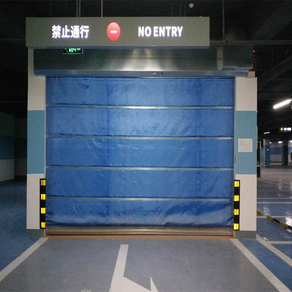 防火卷簾一步降和兩步降怎樣設置(圖1) 地下車庫的防火卷簾門.jpg